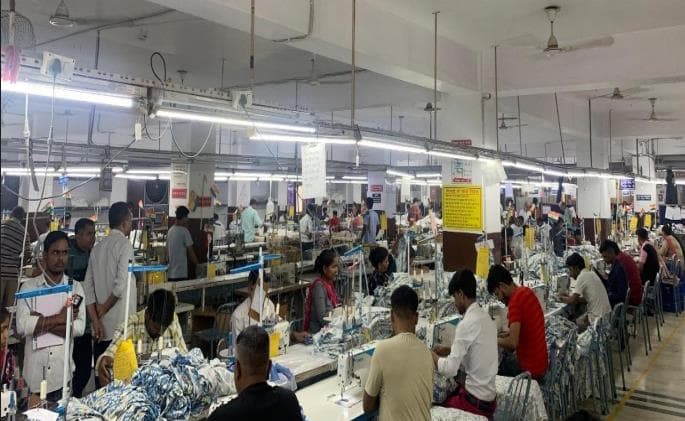 Active apparel sewing floor with production teams and machinery